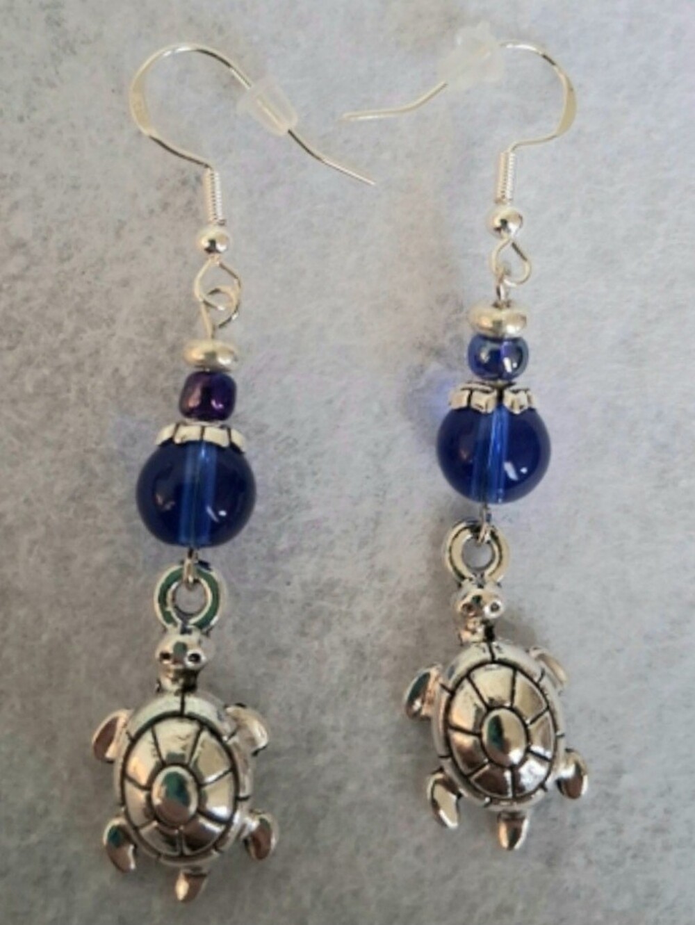 Silver Tone Turtle Charm Drop Pierced Earrings with Royal Blue Glass Beads